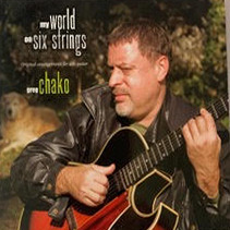 My World on Six Strings, original 2013 CD cover: Greg Chako with his guitar
